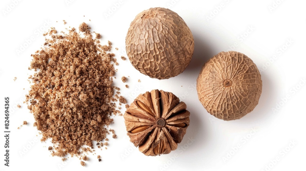 Poster close-up view of nutmeal and nutcrumbs on a white surface. ideal for food and cooking related projec