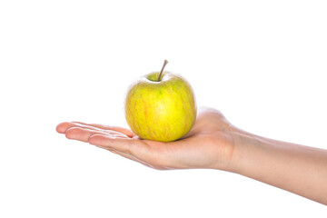 Hand holding green apple isolated on white background. Healthy eating and diet topic: human hand holding apple. Man's hand holding green apple, isolated on white background