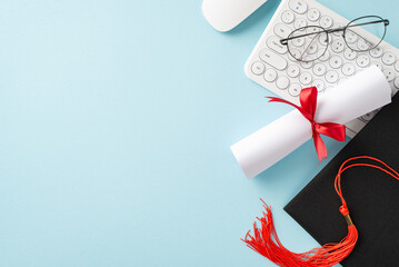 Top view of a graduation cap and diploma, rolled and tied with a red ribbon, alongside glasses and a calculator on a light blue background, symbolizing academic achievements