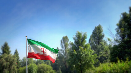 Iranian flag with clear sky to commemorate Iran independence day