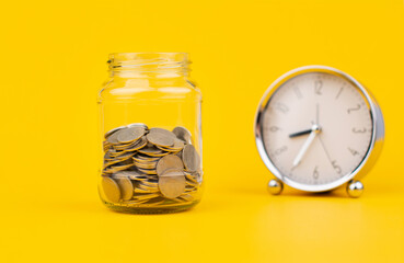 Saving coins in a glass jar, accumulating balance, creating financial discipline. income from work Mutual funds and investing in cash flow