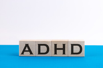 Word ADHD made with wood building blocks