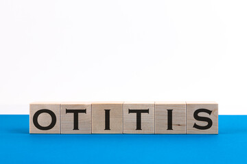 Word Otitis made with wood building blocks