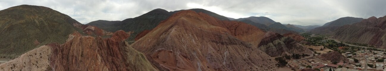 Seven colored mountain and Purmamarca village in Argentina, brightly colored mountain.