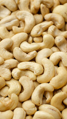 Dried cashew nuts close up. Healthy Food concept