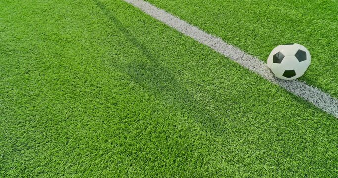 Soccer field impressions - Ball out of play - Soccer ball kicked out of the soccer field - Slow-mo