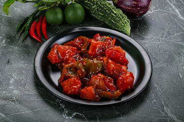 Chinese cuisine - chicken in sweet and sour sauce