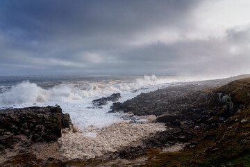 waves crashing on rocks