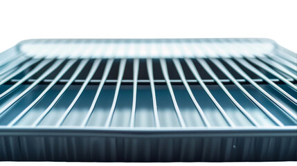 A detailed view of a metallic tray placed on a plain white surface, showcasing its texture and design elements