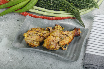 Chicken leg tikka with spices