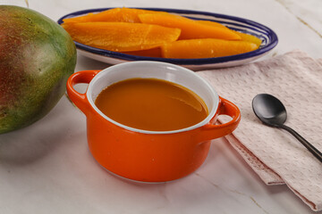 Sweet mango puree in the bowl