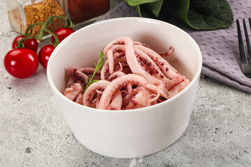 Marinated squid tentacles in the bowl