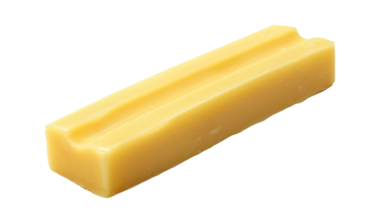 A yellow bar of soap placed on a plain white background