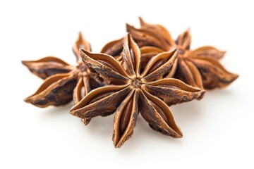 High-quality image of star anise on white background, showing intricate details and vibrant color, perfect for culinary and herbal usage.