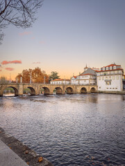 Obraz premium View of Trajan's Roman bridge, reflected on Tamega river, Chaves, Portugal
