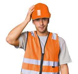 Young Hispanic worker in safety gear being shocked, she has remembered important meeting.