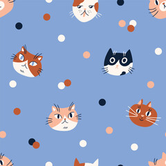 Fototapeta premium Vector cute seamless pattern with cats and colorful dots. Cat seamless fabric design. Kids illustrated animals on blue background. Simple kawaii animal illustration.
