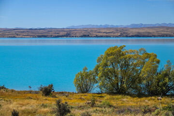 Beautiful lake landscape in autumn, water in turquoise colour, scenic view, Lake Pukaki, New Zealand, South Island