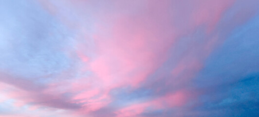 horizontal bright pink blue sky background, copy space