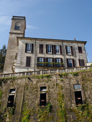 Fototapeta premium Old building along the Martesana canal at Vaprio, Milan