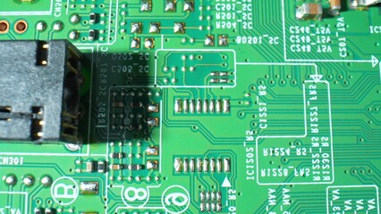 In high-definition, witness the heart of electronics: a Printed Circuit Board (PCB) labyrinth of copper pathways and components, demystifying technology's inner workings. 
