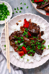 Chinese chicken liver with peppers and onions in the bowl