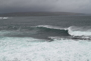 waves crashing on rocks