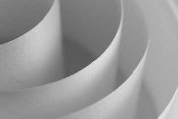 Abstract background of white satin ribbons