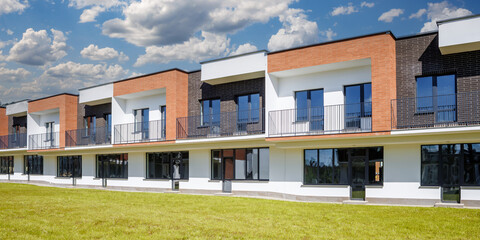 modern low-rise residential townhouse or public buildings complex with several multi-level...