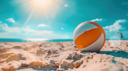 Obraz premium volleyball ball lying on the beach sand against the backdrop of a volleyball net, sea and clear blue sky