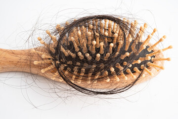 Hair loss fall with comb bush serious problem health, beauty and cosmetic concept.