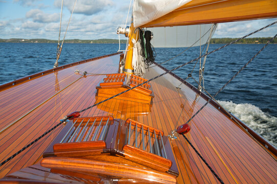 Wooden deck of ship sailing in sea