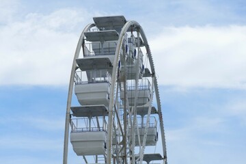 Sky view wheel with clouds and blue sky tourist attraction