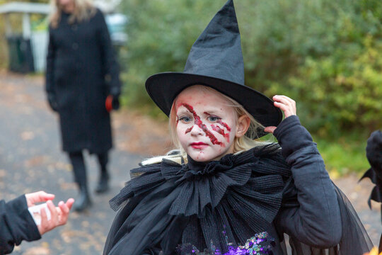 Girl dressed as witch Halloween festival