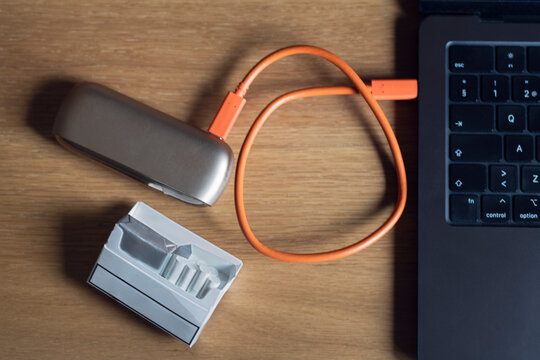 E-cigarette is charging in computer