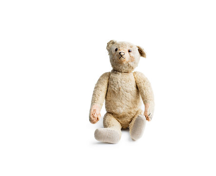 Stuffed teddy bear kept on white background