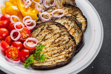 grilled vegetables eggplant, pepper, tomato fresh cooking appetizer meal food snack on the table copy space food background rustic top view