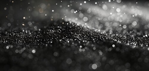 Black dark background glitter bokeh and sparkles