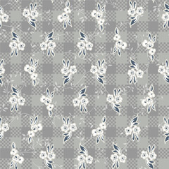 Ditsy floral seamless pattern on checkered texture background