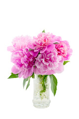bouquet of pink peonies in a crystal vase
