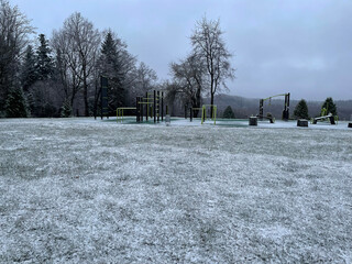 A sports ground for sports in the winter park. Sports equipment in winter. Outdoor activities. © mikhailgrytsiv