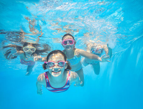 kids swimming in pool