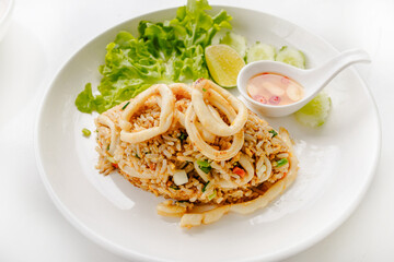 Stir-fried spaghetti with shrimp and squid