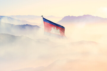 Cambodia flag disappears in beautiful clouds with fog.