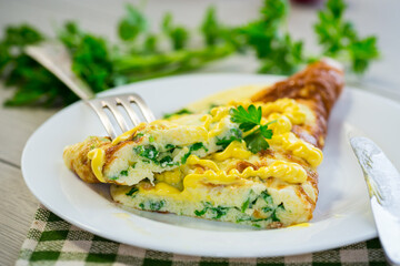 fried omelette stuffed with herbs, parsley, dill