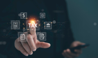 Businessman use smartphone to complete Individual income tax return form online for tax payment. Financial research,government taxes and calculation tax return concept. Tax and Vat concept.