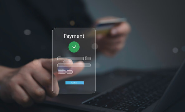Digital online payment concept. Business people using computer laptop, online payment, banking.Online Money Transfer Confirmed.Concept of e-commerce and online banking, payment transfer.