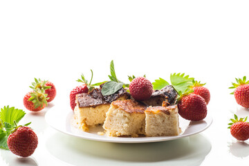 prepared cottage cheese casserole with fresh strawberries