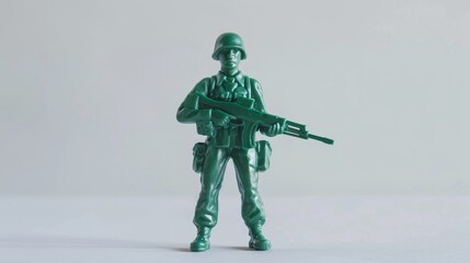 Green Toy Soldier Figurine Holding A Rifle on White Background