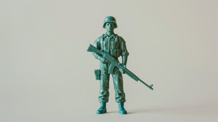 Vintage Green Plastic Toy Soldier with Rifle Standing on Plain Background